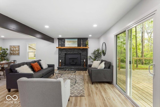 6682 English Dr, Avon, IN 46123 - living room with light wood-type flooring, recessed lighting, and a fireplace