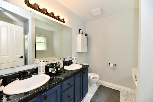 full bath with double vanity, toilet, a bathing tub, and a sink