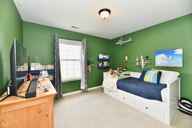 bedroom featuring carpet floors, baseboards, and visible vents