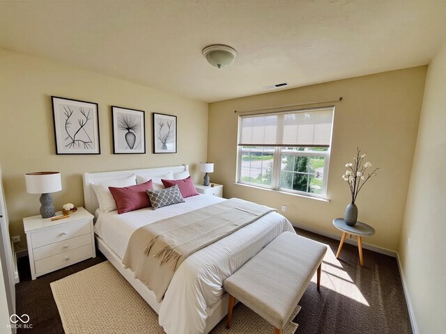 5313 Brandywine Dr, Whitestown, IN 46075 - bedroom featuring dark carpet and baseboards