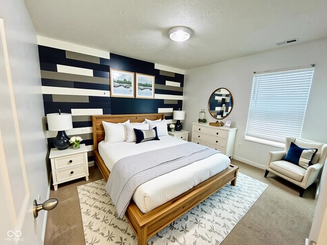 5313 Brandywine Dr, Whitestown, IN 46075 - bedroom with carpet flooring, a textured ceiling, and baseboards