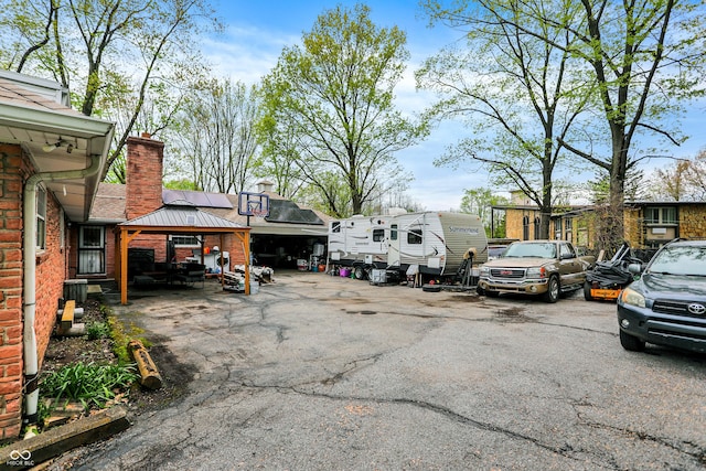 3975 Denwood Dr, Indianapolis, IN 46226 - view of car parking featuring a gazebo