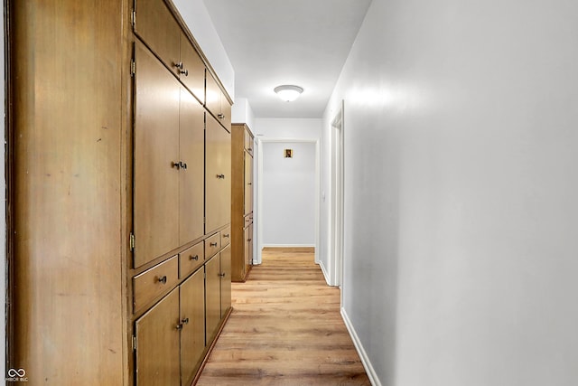 3975 Denwood Dr, Indianapolis, IN 46226 - corridor featuring light wood-type flooring and baseboards