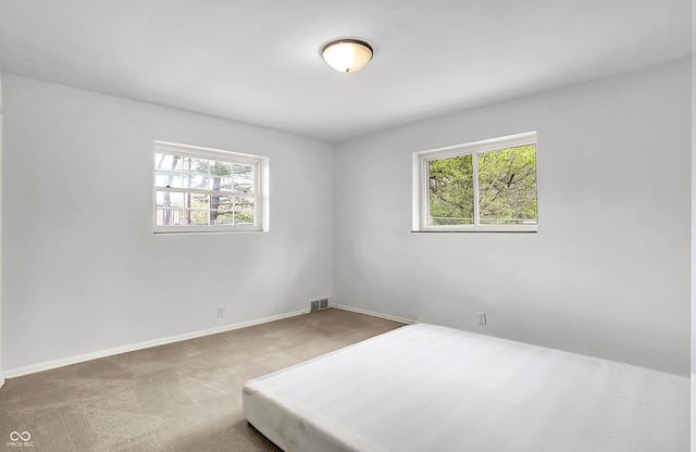 3975 Denwood Dr, Indianapolis, IN 46226 - spare room with carpet and baseboards