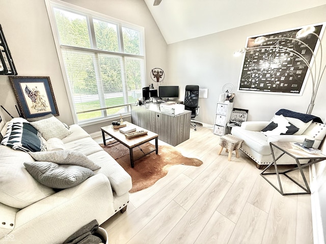 14035 Stone Key Way, Fishers, IN 46037 - living area with an office area, vaulted ceiling, wood finished floors, baseboards, and a ceiling fan