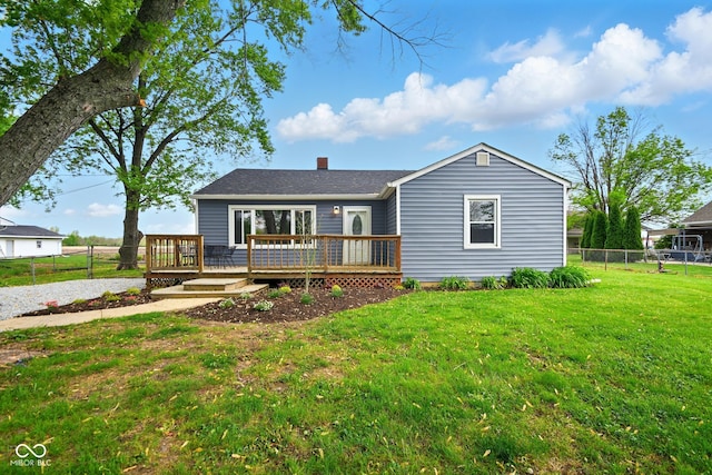 view of front of house featuring a wooden deck and a chimney