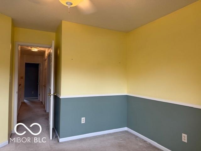 8002 Windham Lake Way Unit 33, Indianapolis, IN 46214 - unfurnished room with a ceiling fan, carpet, and baseboards