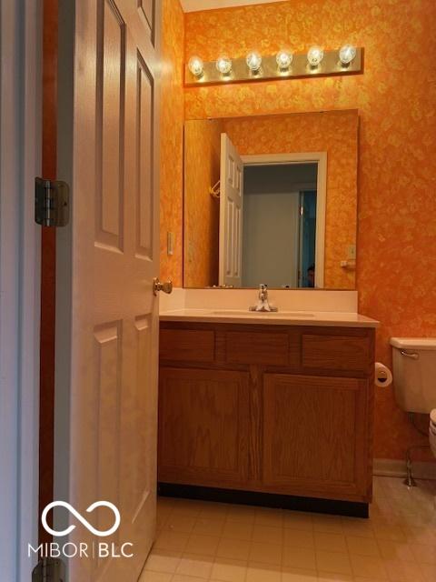 8002 Windham Lake Way Unit 33, Indianapolis, IN 46214 - bathroom featuring toilet and vanity