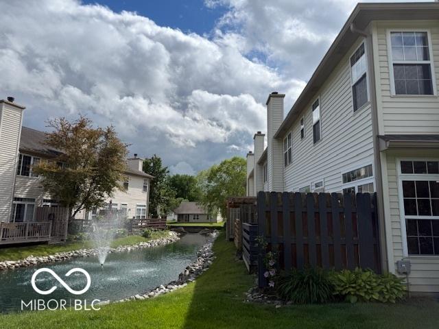8002 Windham Lake Way Unit 33, Indianapolis, IN 46214 - view of yard with a water view