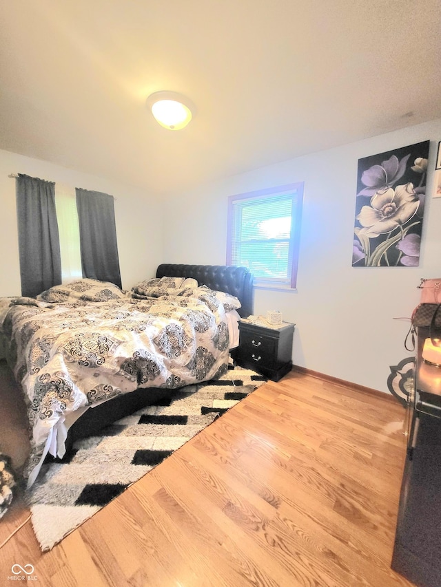 7109 Chandler Dr, Indianapolis, IN 46217 - bedroom featuring wood finished floors and baseboards