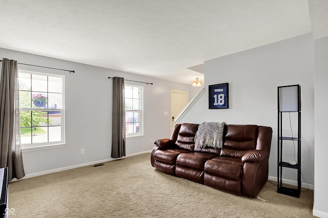 6624 Lakestone Ct, Indianapolis, IN 46237 - living room with carpet flooring and baseboards
