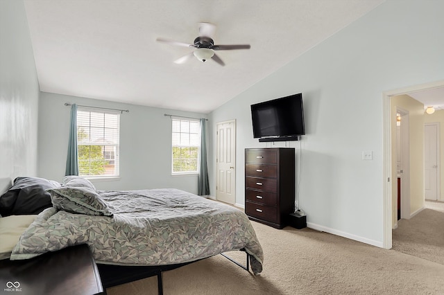 6624 Lakestone Ct, Indianapolis, IN 46237 - bedroom featuring lofted ceiling, light colored carpet, baseboards, a closet, and ceiling fan