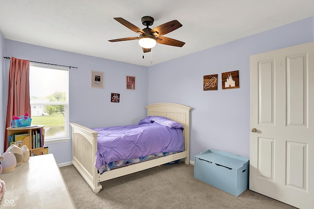 6624 Lakestone Ct, Indianapolis, IN 46237 - bedroom with light carpet, baseboards, and a ceiling fan