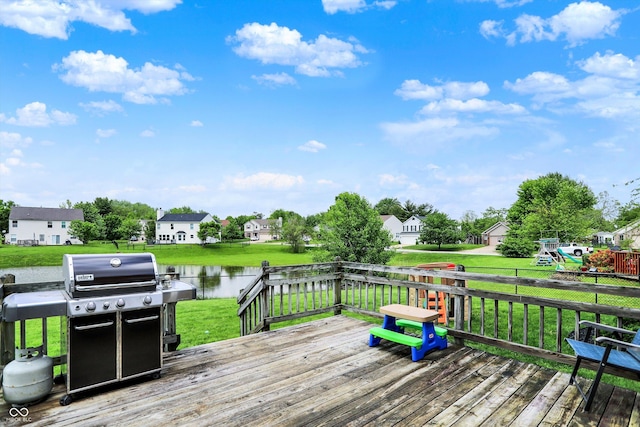6624 Lakestone Ct, Indianapolis, IN 46237 - deck with area for grilling, a water view, a residential view, and a playground