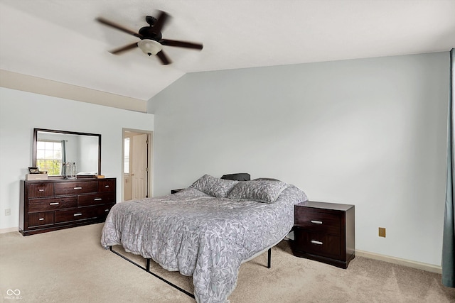 6624 Lakestone Ct, Indianapolis, IN 46237 - bedroom featuring light carpet, vaulted ceiling, baseboards, and ceiling fan