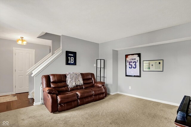 6624 Lakestone Ct, Indianapolis, IN 46237 - living area with carpet, stairway, and baseboards