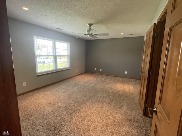 8234 Crosser Dr, Indianapolis, IN 46237 - unfurnished room with ceiling fan, light carpet, a textured ceiling, and baseboards