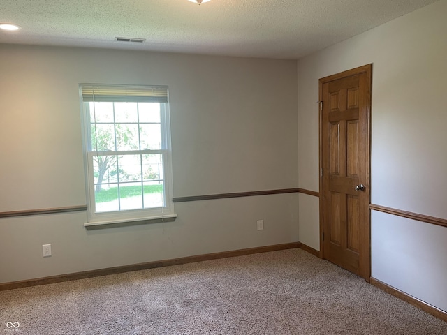 8234 Crosser Dr, Indianapolis, IN 46237 - carpeted spare room with a textured ceiling, baseboards, visible vents, and recessed lighting