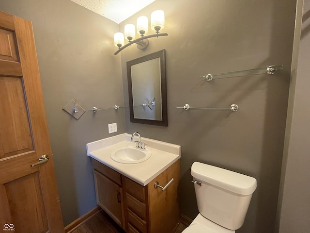 8234 Crosser Dr, Indianapolis, IN 46237 - half bathroom featuring toilet and vanity