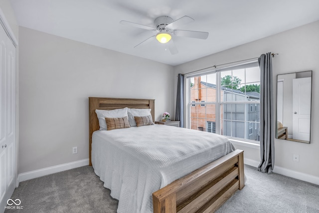 952 Junction Pl, Indianapolis, IN 46220 - carpeted bedroom featuring baseboards, a ceiling fan, and a closet