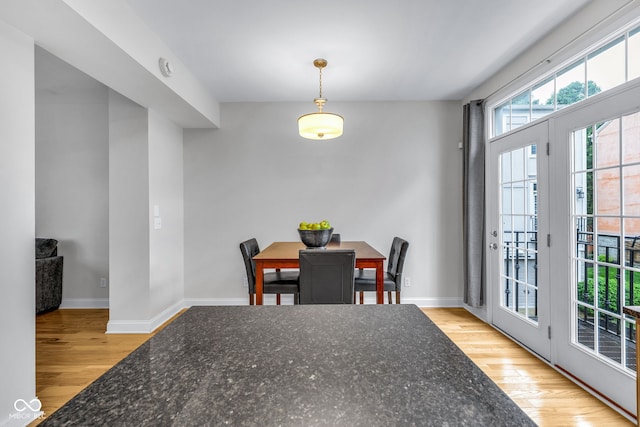 952 Junction Pl, Indianapolis, IN 46220 - dining room featuring light wood-style flooring and baseboards