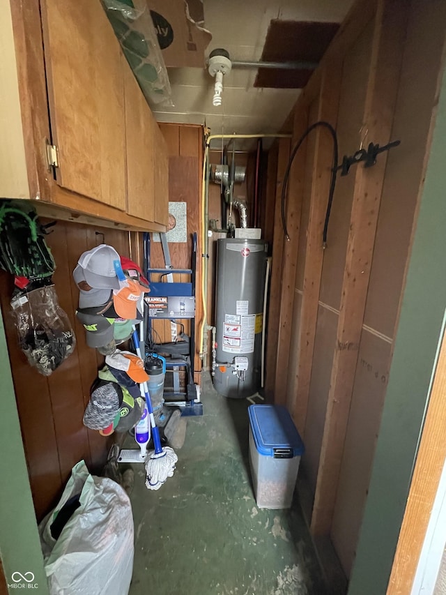 utility room with gas water heater