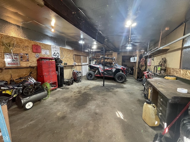 garage with a workshop area