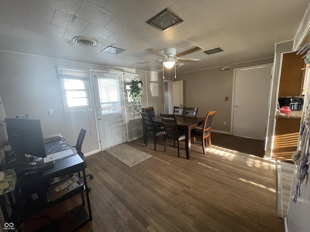 dining area featuring a ceiling fan, dark wood-type flooring, baseboards, and visible vents