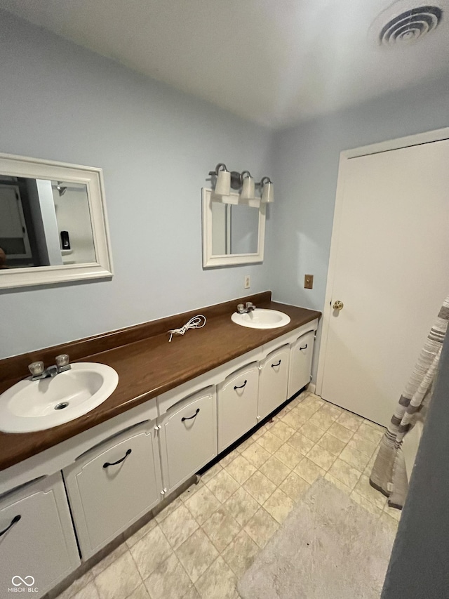 1122 Shelby St, Shelbyville, IN 46176 - bathroom with double vanity