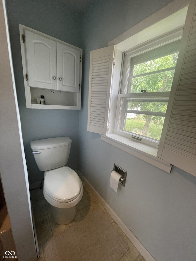 1122 Shelby St, Shelbyville, IN 46176 - bathroom with toilet and tile patterned flooring