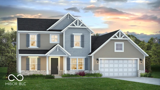 craftsman-style home with a yard, roof with shingles, and concrete driveway