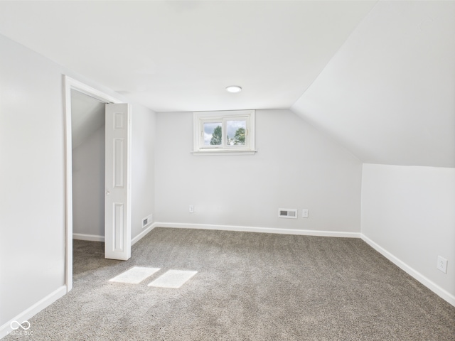 225 S Carthage Rd, Charlottesville, IN 46117 - additional living space featuring carpet, baseboards, and vaulted ceiling