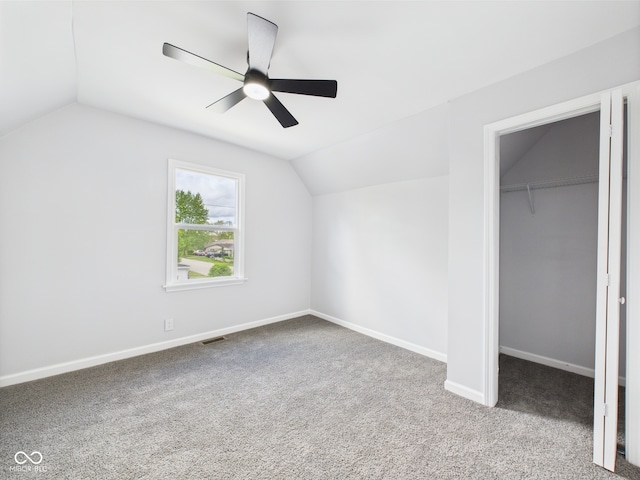 225 S Carthage Rd, Charlottesville, IN 46117 - bonus room with vaulted ceiling, carpet, ceiling fan, and baseboards