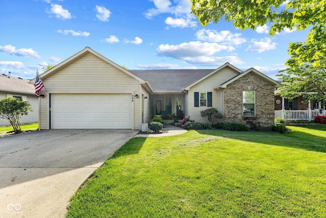 single story home with a garage, driveway, a front lawn, brick siding, and a shingled roof
