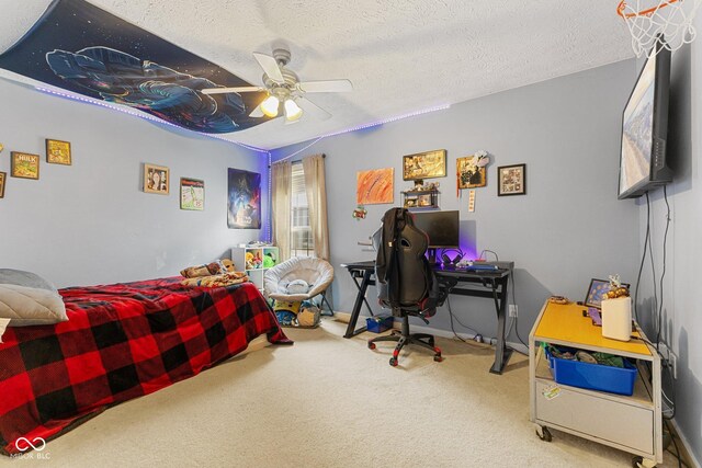 carpeted bedroom with a ceiling fan and a textured ceiling