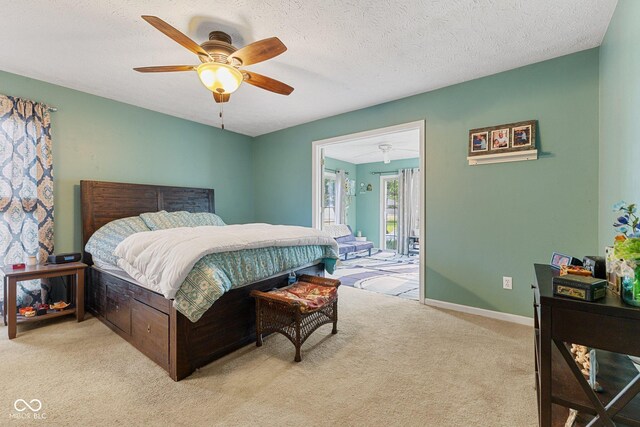 bedroom with light colored carpet, a ceiling fan, and baseboards