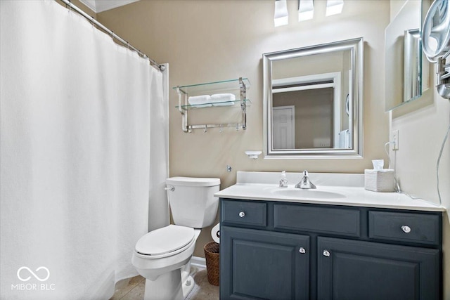 bathroom with toilet and vanity
