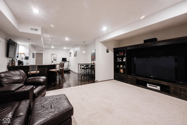 14030 Avalon E Dr, Fishers, IN 46037 - living area with recessed lighting, dark wood-style floors, a bar, and baseboards