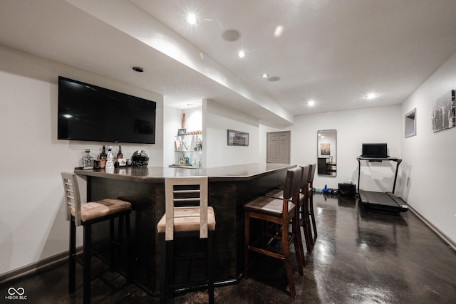 14030 Avalon E Dr, Fishers, IN 46037 - indoor dry bar featuring baseboards, finished concrete floors, and recessed lighting