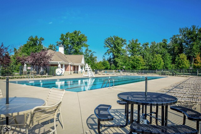 14030 Avalon E Dr, Fishers, IN 46037 - community pool featuring a patio