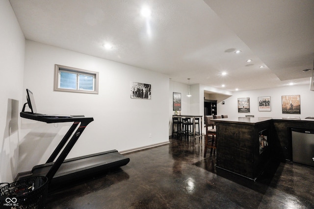 14030 Avalon E Dr, Fishers, IN 46037 - indoor bar featuring dishwasher, recessed lighting, concrete flooring, and baseboards