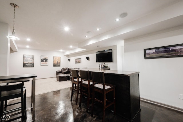 14030 Avalon E Dr, Fishers, IN 46037 - indoor bar with finished concrete flooring, recessed lighting, hanging light fixtures, and baseboards