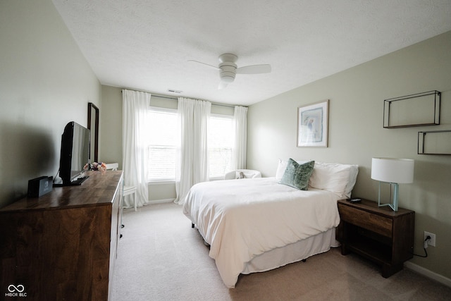 14030 Avalon E Dr, Fishers, IN 46037 - bedroom featuring light colored carpet, baseboards, and a ceiling fan