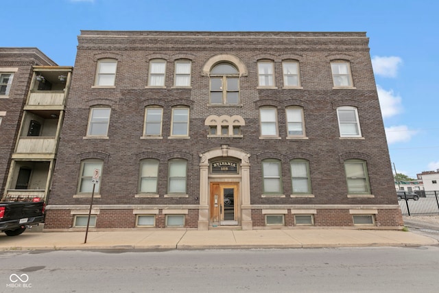 108 E Saint Clair St Unit E, Indianapolis, IN 46204 - view of building exterior with fence