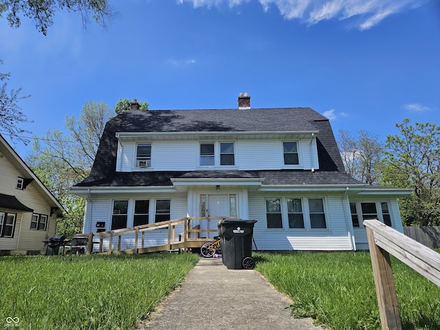1222 Nichol Ave, Anderson, IN 46016 - dutch colonial with a deck, a front yard, and roof with shingles