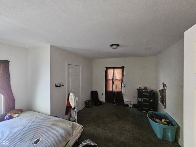 1222 Nichol Ave, Anderson, IN 46016 - carpeted bedroom featuring a textured ceiling