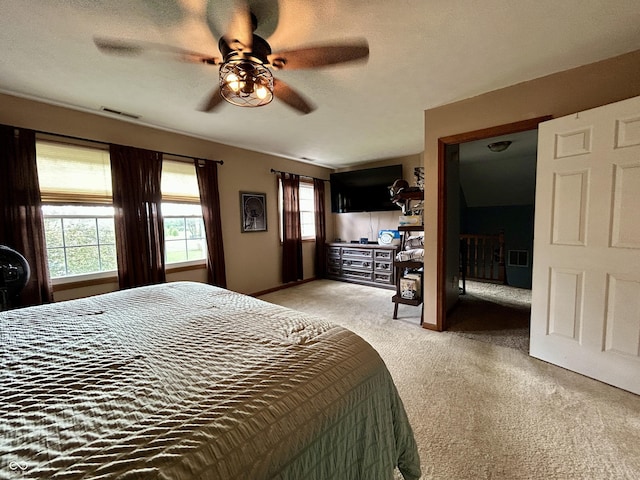 8798 Surrey Dr, Pendleton, IN 46064 - bedroom featuring light colored carpet, a ceiling fan, and baseboards