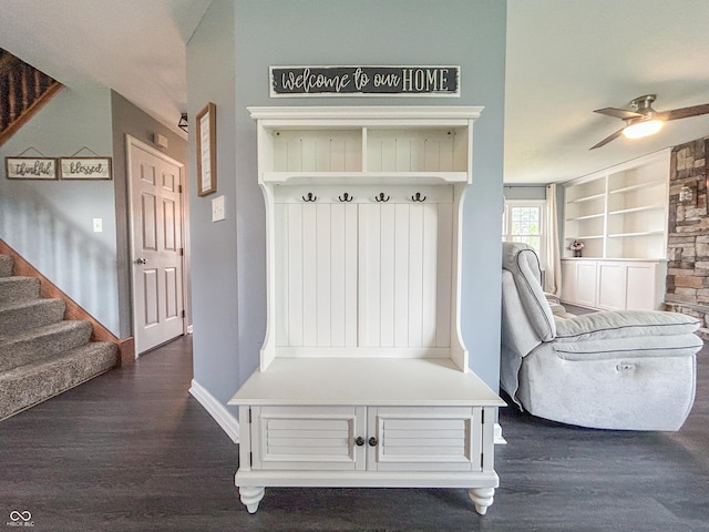 8798 Surrey Dr, Pendleton, IN 46064 - mudroom featuring dark wood-type flooring, baseboards, a ceiling fan, and built in shelves