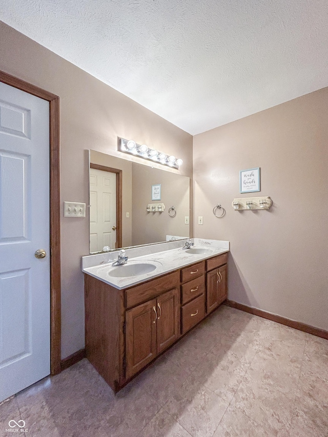 8798 Surrey Dr, Pendleton, IN 46064 - full bath featuring double vanity, baseboards, and a textured ceiling