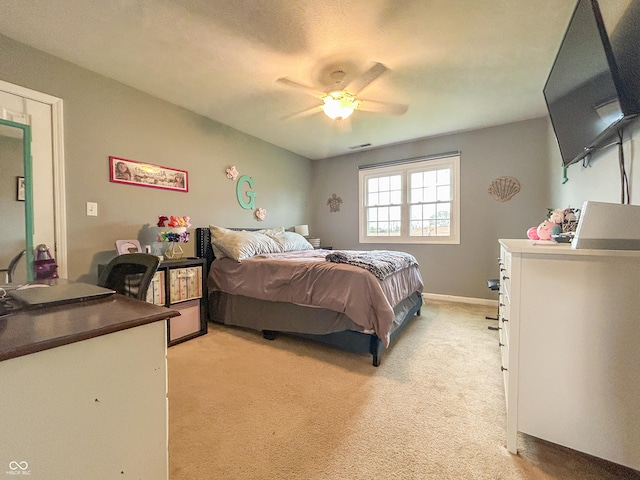 8798 Surrey Dr, Pendleton, IN 46064 - bedroom featuring light colored carpet and a ceiling fan